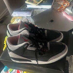 Jordan Black and White Sneakers with Red Accents